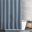 paket med blå duschdraperi och badrumsmatta